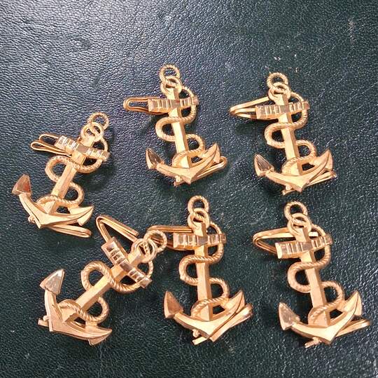 Naval anchor insignia- with a rope passing over the ring- New old stock- Price by one