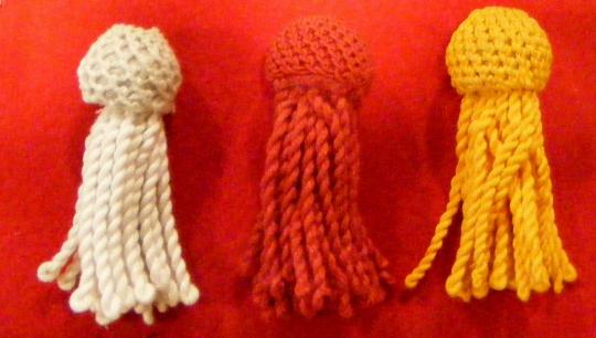 Pompons, different colours, for 